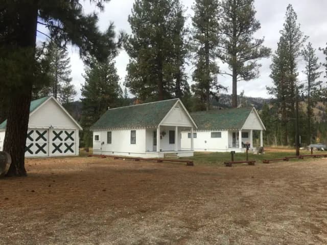 The cabins are nestled in the pines with running hot water, beds to sleep 4, bathroom, shower with a picnic table, fire ring and pedestal grill located behind the cabin.