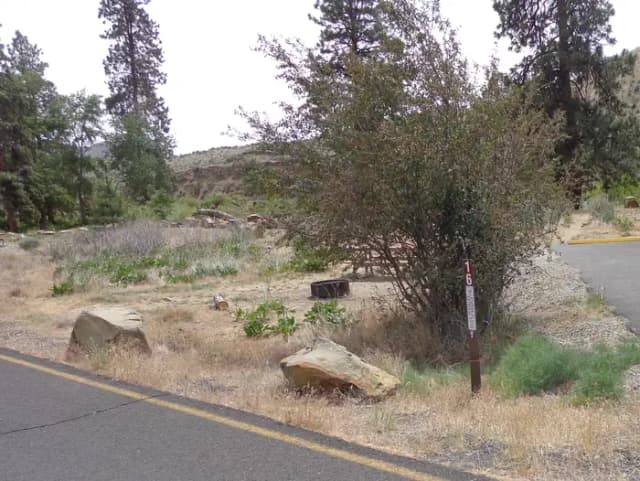 Parking pad and fire ring at Big Pines Campsite #16