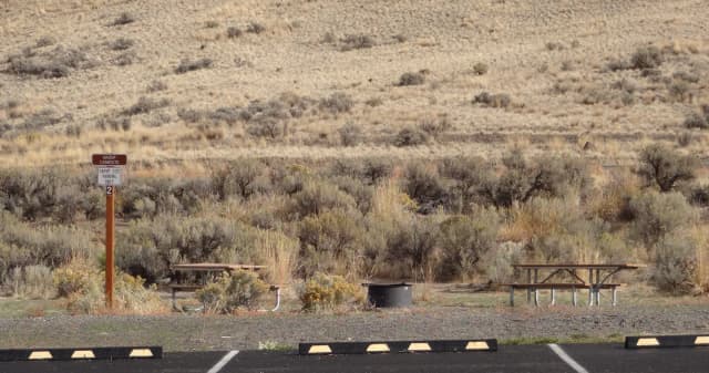2 parking spots, 2 picnic tables and fire ring at Big Pines Group Campsite E