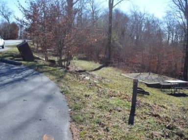 A photo of Site 33 of Loop BALSAM MOUNTAIN CAMPGROUND at BALSAM MOUNTAIN CAMPGROUND with Picnic Table, Fire Pit, Tent Pad