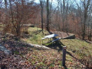 A photo of Site 34 of Loop BALSAM MOUNTAIN CAMPGROUND at BALSAM MOUNTAIN CAMPGROUND with Picnic Table, Fire Pit, Tent Pad