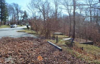 A photo of Site 34 of Loop BALSAM MOUNTAIN CAMPGROUND at BALSAM MOUNTAIN CAMPGROUND with Picnic Table, Fire Pit, Tent Pad