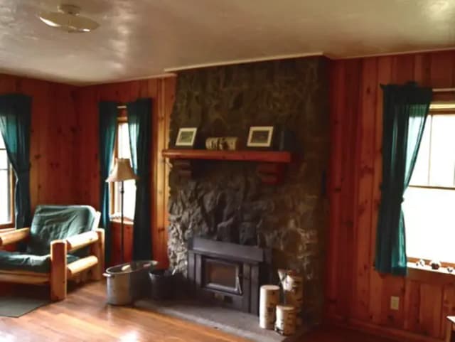 Stub Creek cabin living room with fireplace.