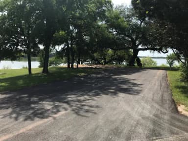 Double RV site with picnic tables, grill, and fire ring