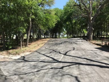 Double RV site with picnic tables, grill, and fire ring
