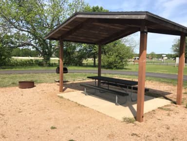 Covered picnic table, grill, and fire ring