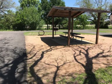 Covered picnic table, grill, and fire ring