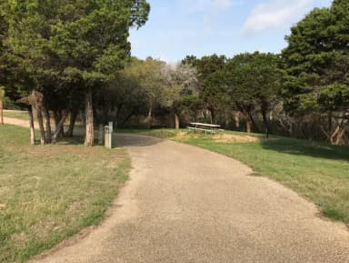 Pull through RV site with grill, fire ring, and picnic table