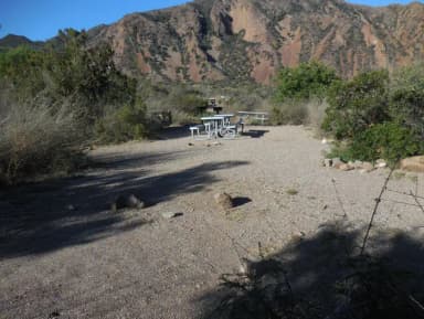 Campsite N with mountains in the background