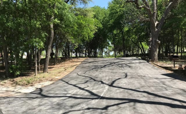 Double RV site with picnic tables, grill, and fire ring
