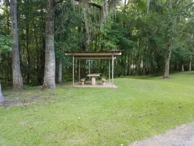 A photo of Site 05 of Loop MAGNOLIA RIDGE  at MAGNOLIA RIDGE with Picnic Table
