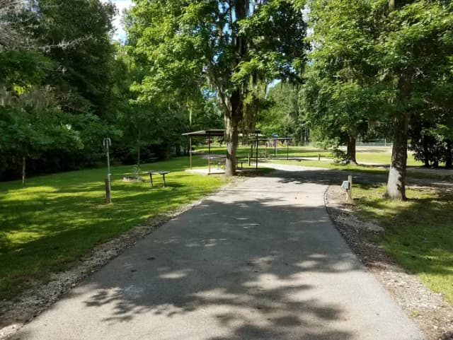 A photo of Site 07 of Loop MAGNOLIA RIDGE  at MAGNOLIA RIDGE with Picnic Table, Electricity Hookup, Fire Pit, Lantern Pole, Water Hookup