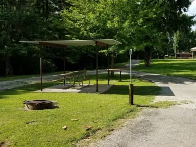 A photo of Site 06 of Loop MAGNOLIA RIDGE  at MAGNOLIA RIDGE with Picnic Table, Fire Pit, Lantern Pole