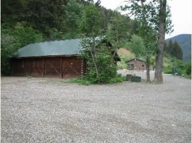 Site 01, Lower Hyalite Group Area - building, fire ring & Cottonwood trees