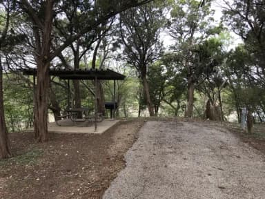 RV site with covered picnic table and grill