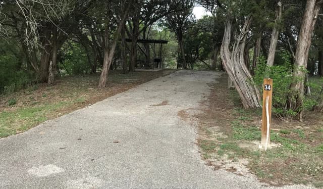 RV site with covered picnic table and grill