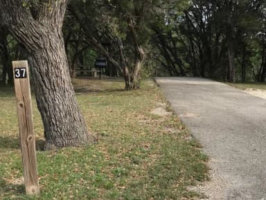 RV site with covered picnic table and grill