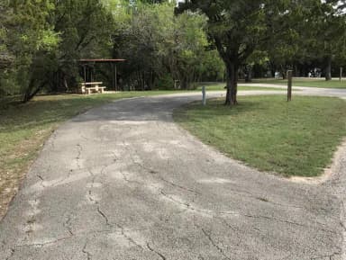 Pull through RV site with grill and covered picnic table