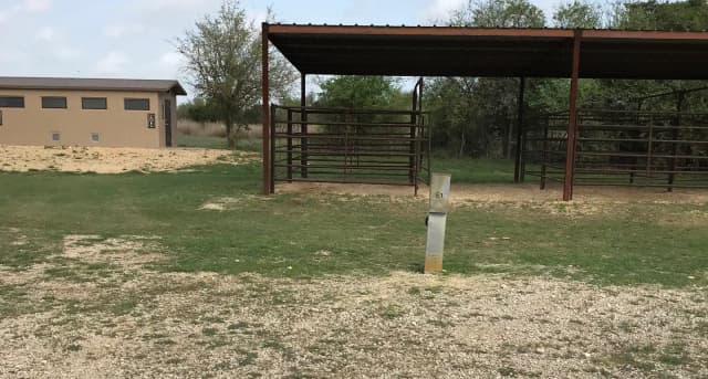 Equestrian site hookup with two stalls and restroom/shower facility nearby