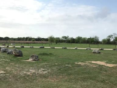 View of hitching posts and trailhead from site