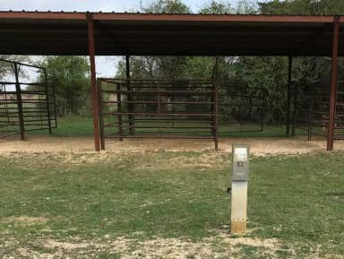 Equestrian site hookup with two stalls and restroom/shower facility nearby