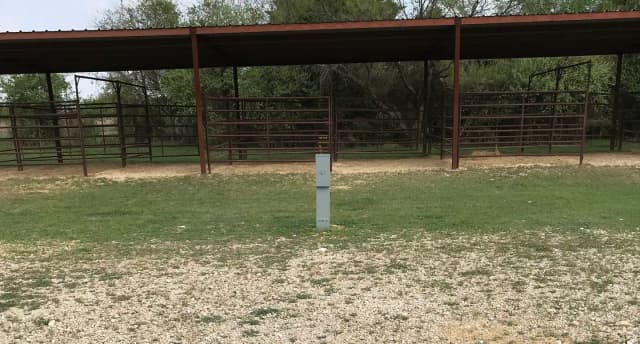 Equestrian site hookup with two stalls and restroom/shower facility nearby