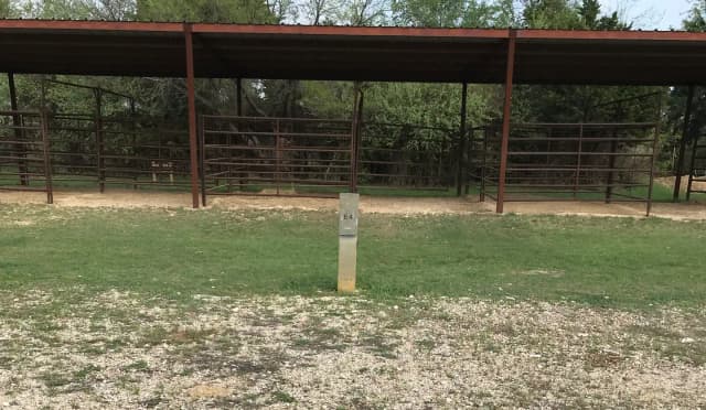 Equestrian site hookup with two stalls and restroom/shower facility nearby