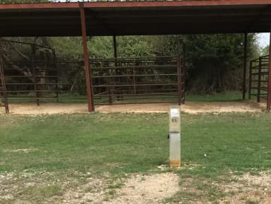 Equestrian site hookup with two stalls and restroom/shower facility nearby