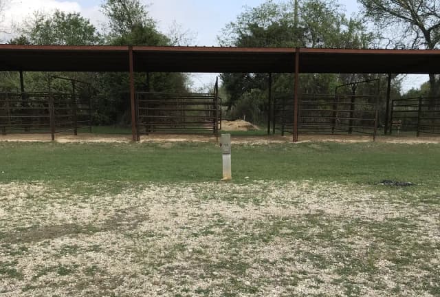 Equestrian site hookup with two stalls and restroom/shower facility nearby