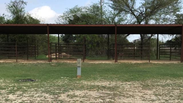 Equestrian site hookup with two stalls and restroom/shower facility nearby