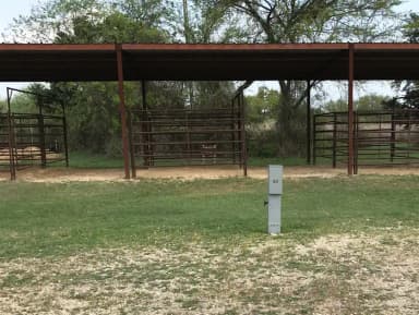 Equestrian site hookup with two stalls and restroom/shower facility nearby