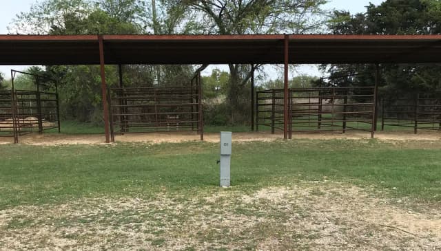 Equestrian site hookup with two stalls and restroom/shower facility nearby