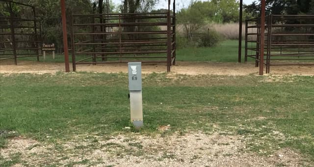 Equestrian site hookup with two stalls and restroom/shower facility nearby