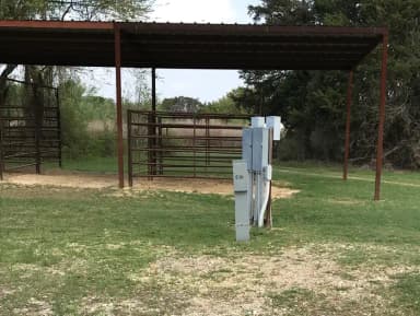 Equestrian site hookup with two stalls and restroom/shower facility nearby
