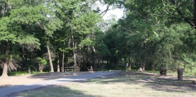 A photo of Site 23B of Loop SBAY at SUNLIGHT BAY with Picnic Table, Electricity Hookup, Shade, Water Hookup