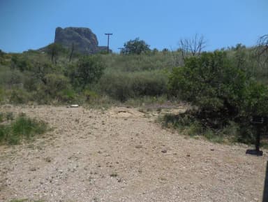 Flat, gravel tent area
