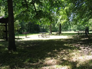 Group Campsite 3 showing picnic tables, lantern post and food shelter.