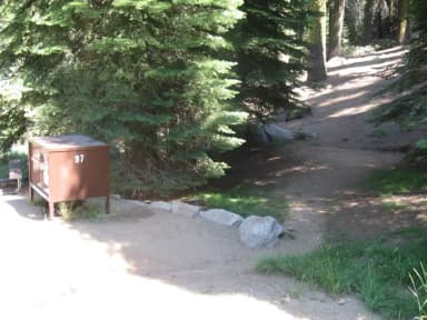 site 97, no generator loop, partial shade, near creek, not level site