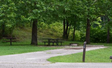 Campsite 13 showing parking spur, picnic tables, and fire ring