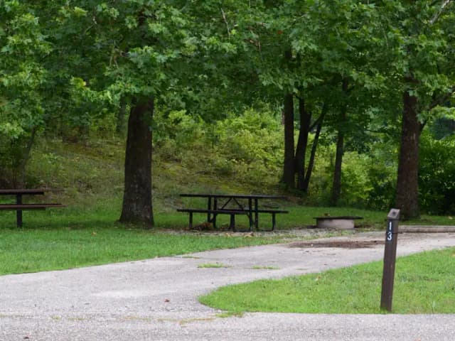 Campsite 13 showing parking spur, picnic tables, and fire ring