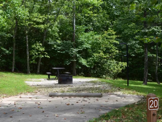 Campsite 20 showing parking spur, picnic table, lantern post and fire ring