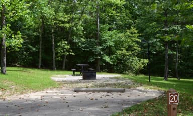 Campsite 20 showing parking spur, picnic table, lantern post and fire ring