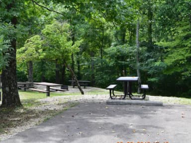 Campsite 21 showing parking spur, picnic table, lantern post and fire ring
