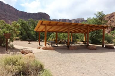 Big Bend Group Site B shade shelter with picnic tables.