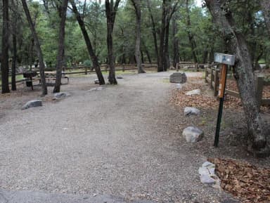 Campsite #9 is difficult to back into for trailers and motorhomes.