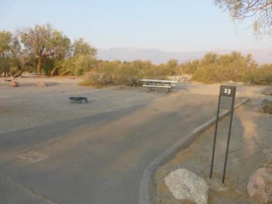 Furnace Creek Campground standard nonelectric site #23 with picnic table and fire ring
