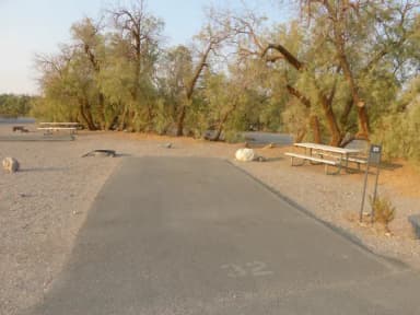 Furnace Creek Campground standard nonelectric site #32 with picnic table and fire ring.