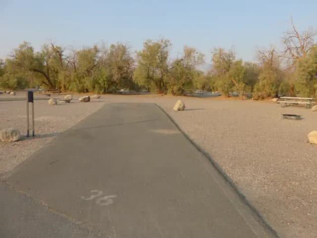 Furnace Creek Campground standard nonelectric site #36 with picnic table and fire ring.