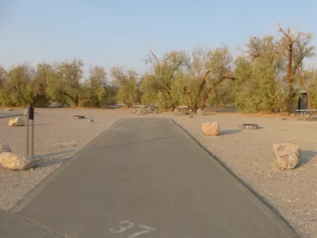 Furnace Creek Campground standard nonelectric site #37 with picnic table and fire ring.