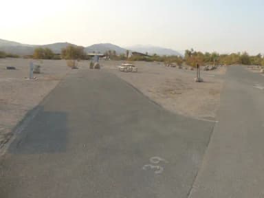 Furnace Creek Campground full hookup site #39. Water, sewer, and 30/50 amp electric connection. One fire pit and one picnic table.